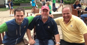 Alex Adamson (left) former ND player Bill Hackett, and Gary Adamson outside Hammes Notre Dame Bookstore before the Michigan game Saturday.